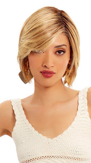 A unique bob falling above the collar that has short textured layers, beach waves and silky feathered bangs