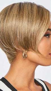 This heat friendly synthetic wig has an extended lace front and monofilament part for a natural look at the hairline and part