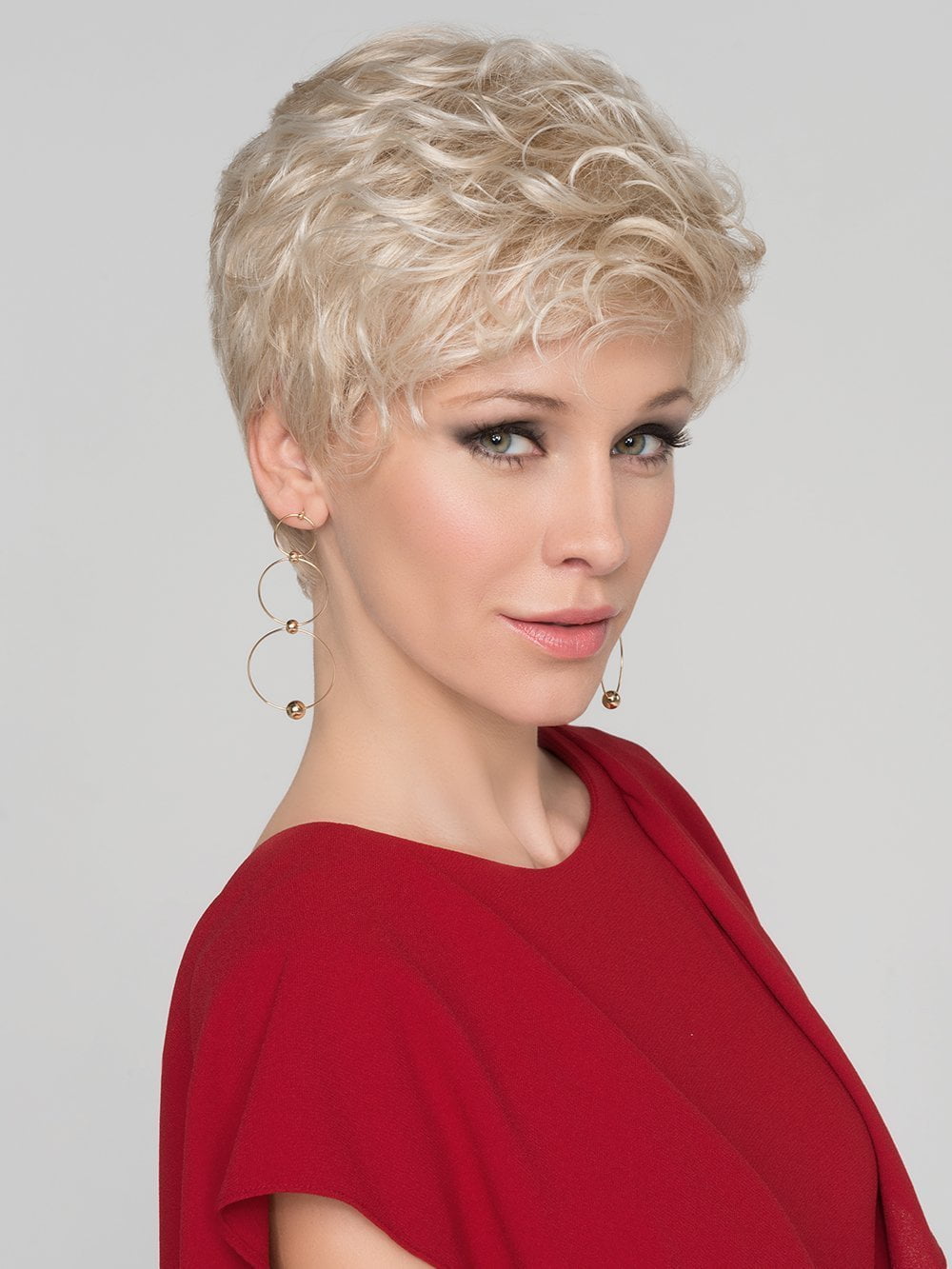 Wear this classic short wig smooth and chic or style with product to create a more modern take