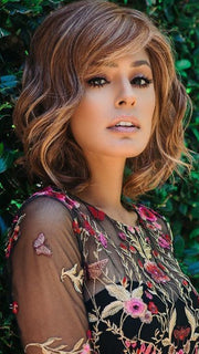The softly waved top and bangs blend perfectly into full layers that make for a trendy, tousled look that can be finger styled or brushed into a fuller silhouette of soft waves.
