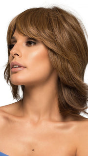 This unique blend of 70% heat friendly fiber and 30% human hair far exceeds other heat friendly styles with built-in moisture control (This piece has been styled for this look)