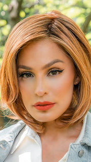 Upstage by Raquel Welch in color RL29/33SS ICED PUMPKIN SPICE | Strawberry Blonde shaded with Dark Red-Brown
