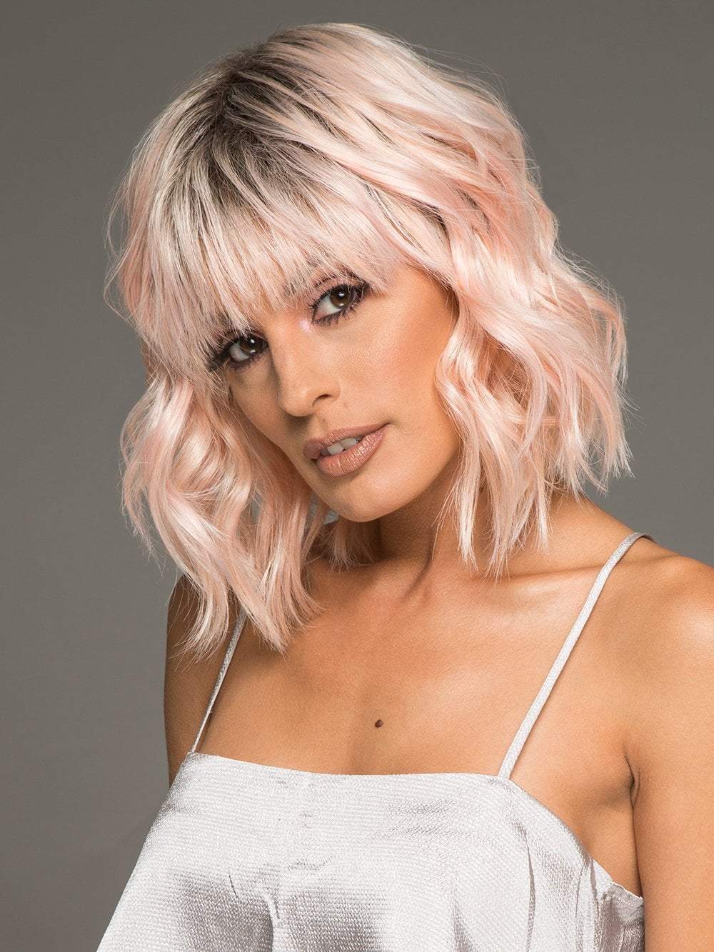 PEACHY KEEN by HAIRDO in PEACH | Light Peachy-Pink Rooted | The bangs were cut & customized for this photo