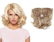 15" wavy clip in extensions by Jessica Simpson