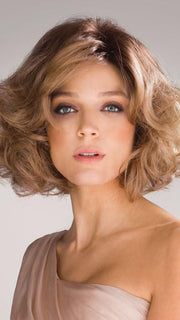 AMAL by Rene of Paris in MACADAMIA-LR | The root is soft brown color that melts into a beige blonde color (PIECE WAS STYLED AND CURLED)