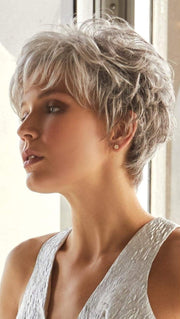This soft layered short pixie can be brushed over the top to create a touch of height.
