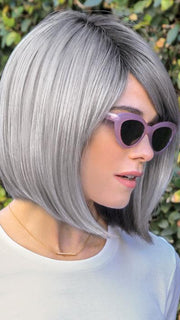 The Vada Wig by Amore is a sleek bob framing the chin featuring a natural side swept fringe