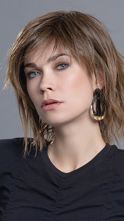 A unique bob that features beach waves with a razor-cut finish