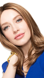 A long, straight wig with natural layers to frame the face