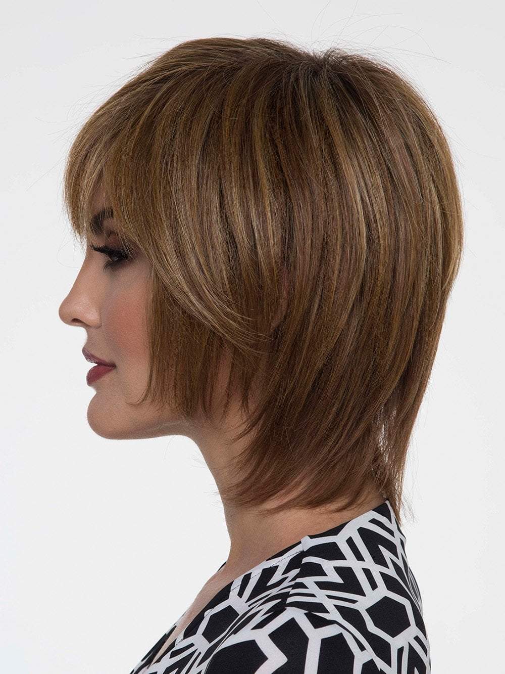 The Monofilament Top construction offers hand-tied sides and back, which allows you to part this wig left, right, or down the center