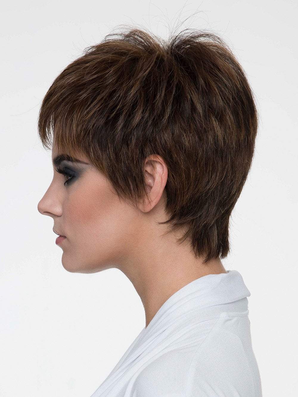 Flat iron for a spiky edge or heat roll for a softer appearance