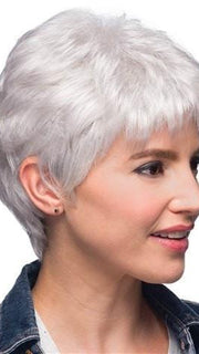 A short soft pixie cut with tapered backs and sides