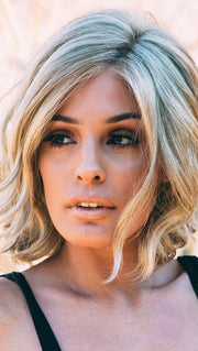Featuring a hand-knotted monofilament part for various parting options