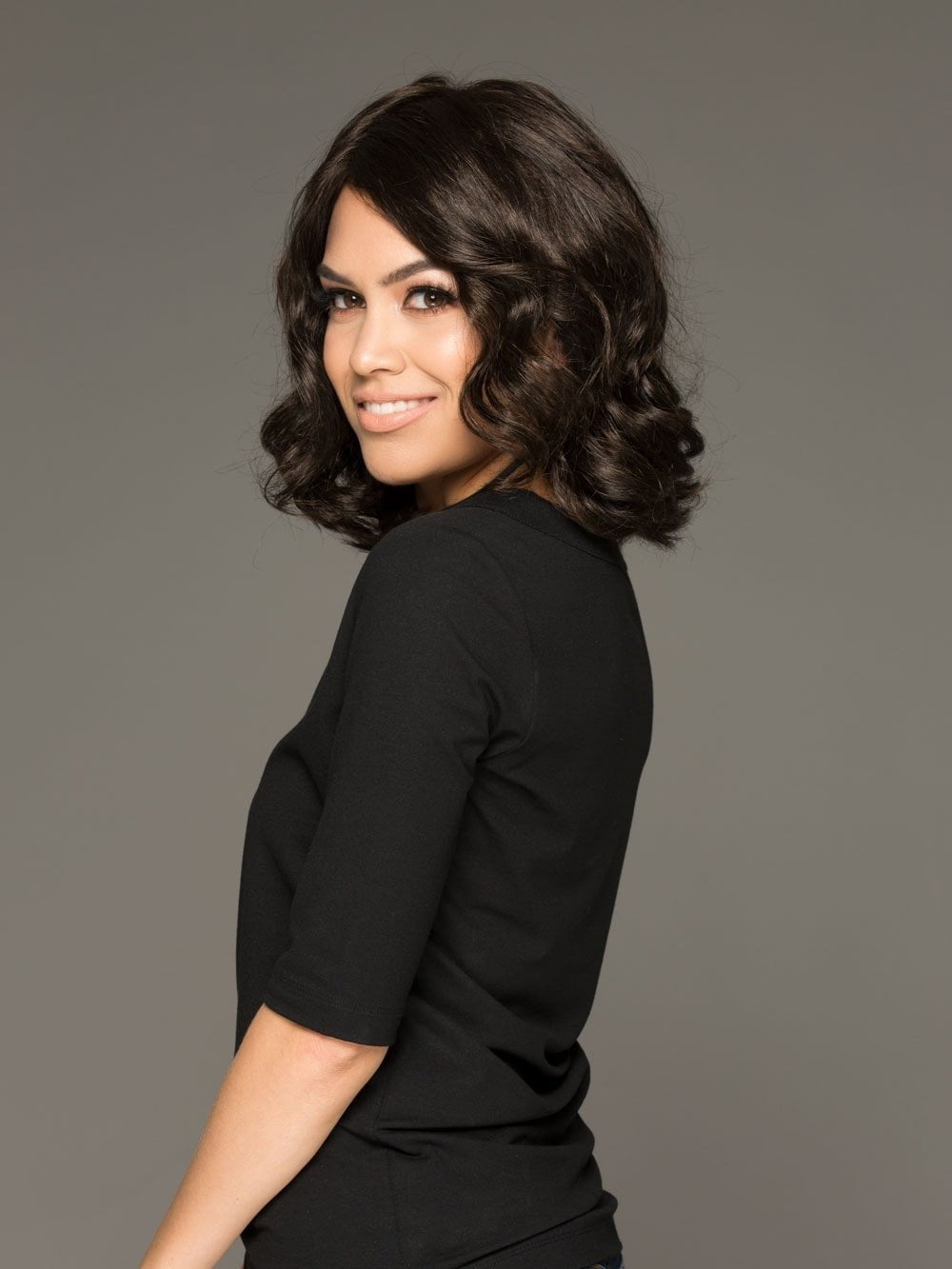 Envy Brittaney is a loosely waved, long bob wig that’s glamorous and ready to wear