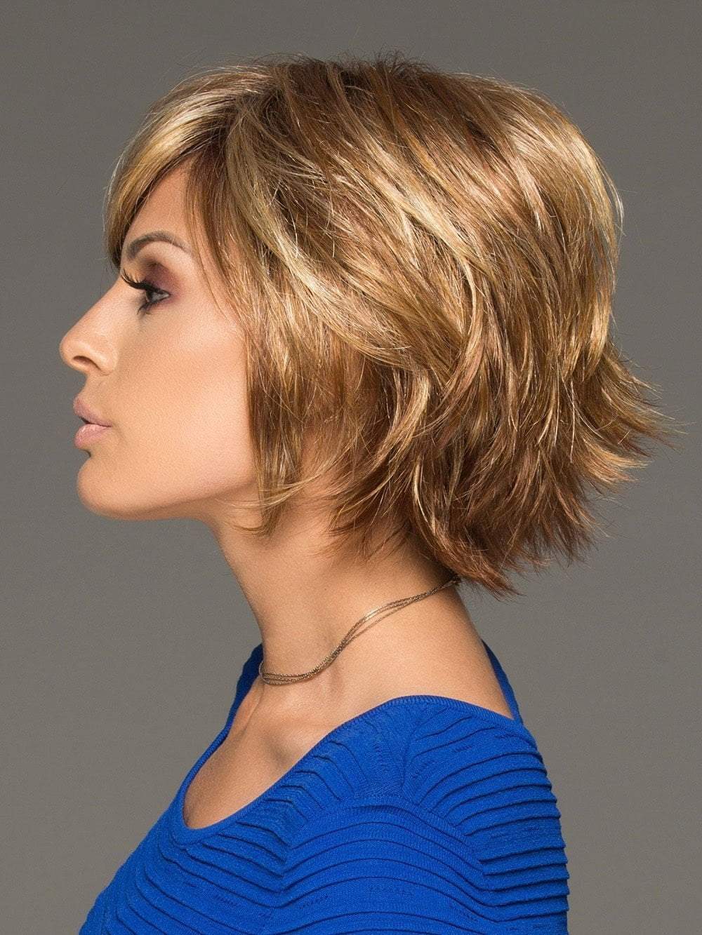 The longer sidepieces and fringe can be cut or trimmed by your stylist. This short wig is full of layers, flips, and angles