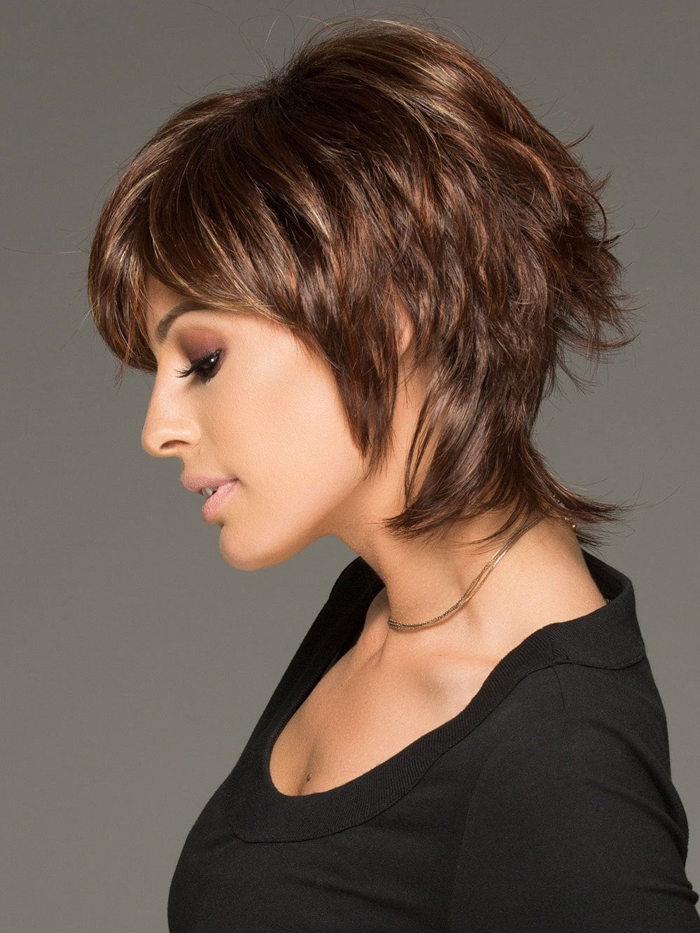 his cutting edge hair style has gorgeous layers and a long wispy nape for texture & easy styling