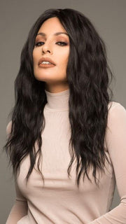 A wavy wig with long layers and a center part