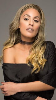 A long wavy wig with a front braid and lace front