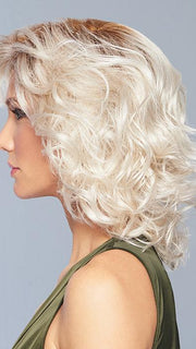 The eyelash bang adds a subtle frame to emphasize the eyes