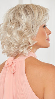 The salon-inspired barrel curls flatter any face frame