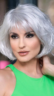 Feathered bangs and textured waves give this classic cut a bit of edge