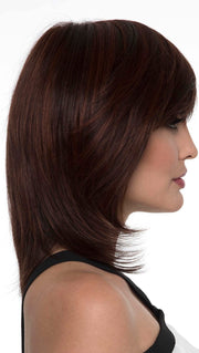 Thick, side-swept bangs and long, face-framing layers