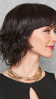 The softly waved crown and fringe blend to spiral tendrils that are light and airy