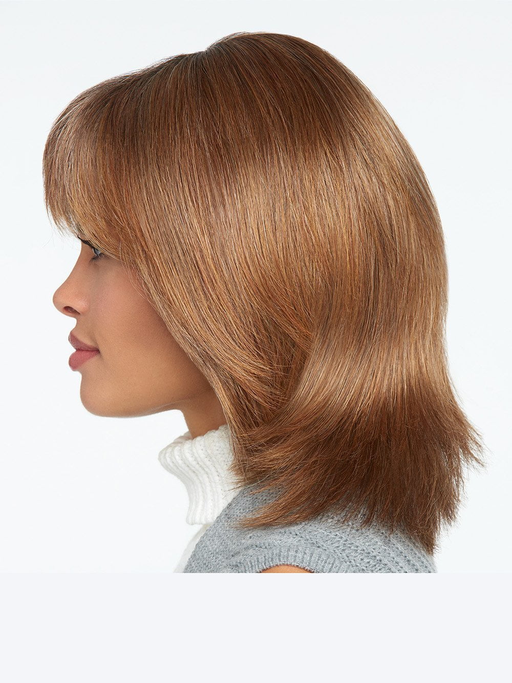 This precision crafted collarbone length cut reflects a popular trend offered in today’s top salons