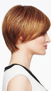 This short wig has a asymmetrical cut and added length on the right top and side.