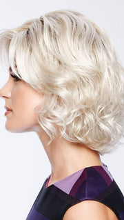 An eyelash bang graces the front to add an air of flirtation, while softly layered lengths throughout offer fullness and movement