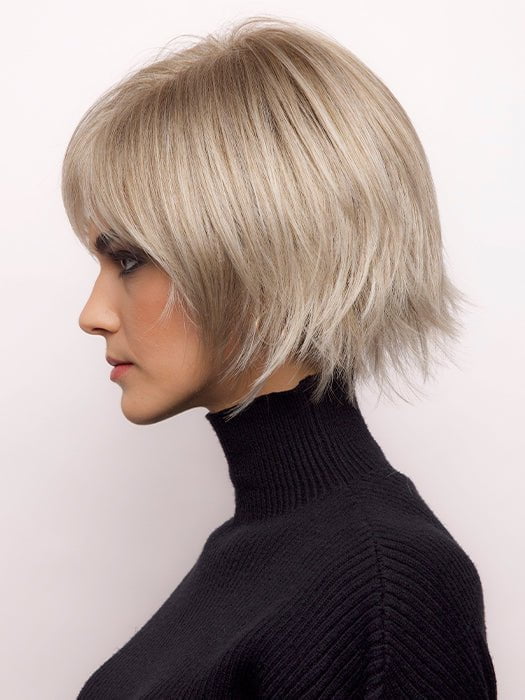A machine made layered bob with a feathered full fringe