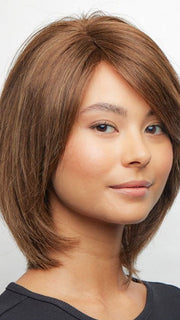A medium-length human hair wig
