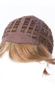 Basic Cap, also known as a capless or traditional construction, has open wefting