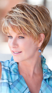 Short and natural classic hair style with subtle layering and tapered edges