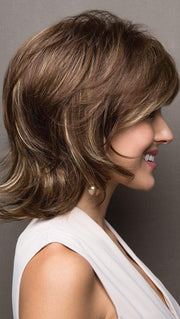 Short, layered cut flips at the collar and has soft, textured edges.