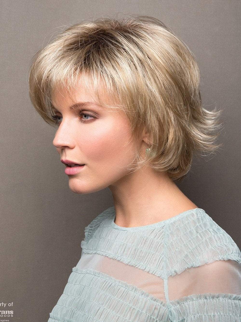 Short face flattering bob with feathered layers and wispy ends
