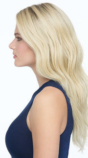 A long wig with soft waves at the crown and sides