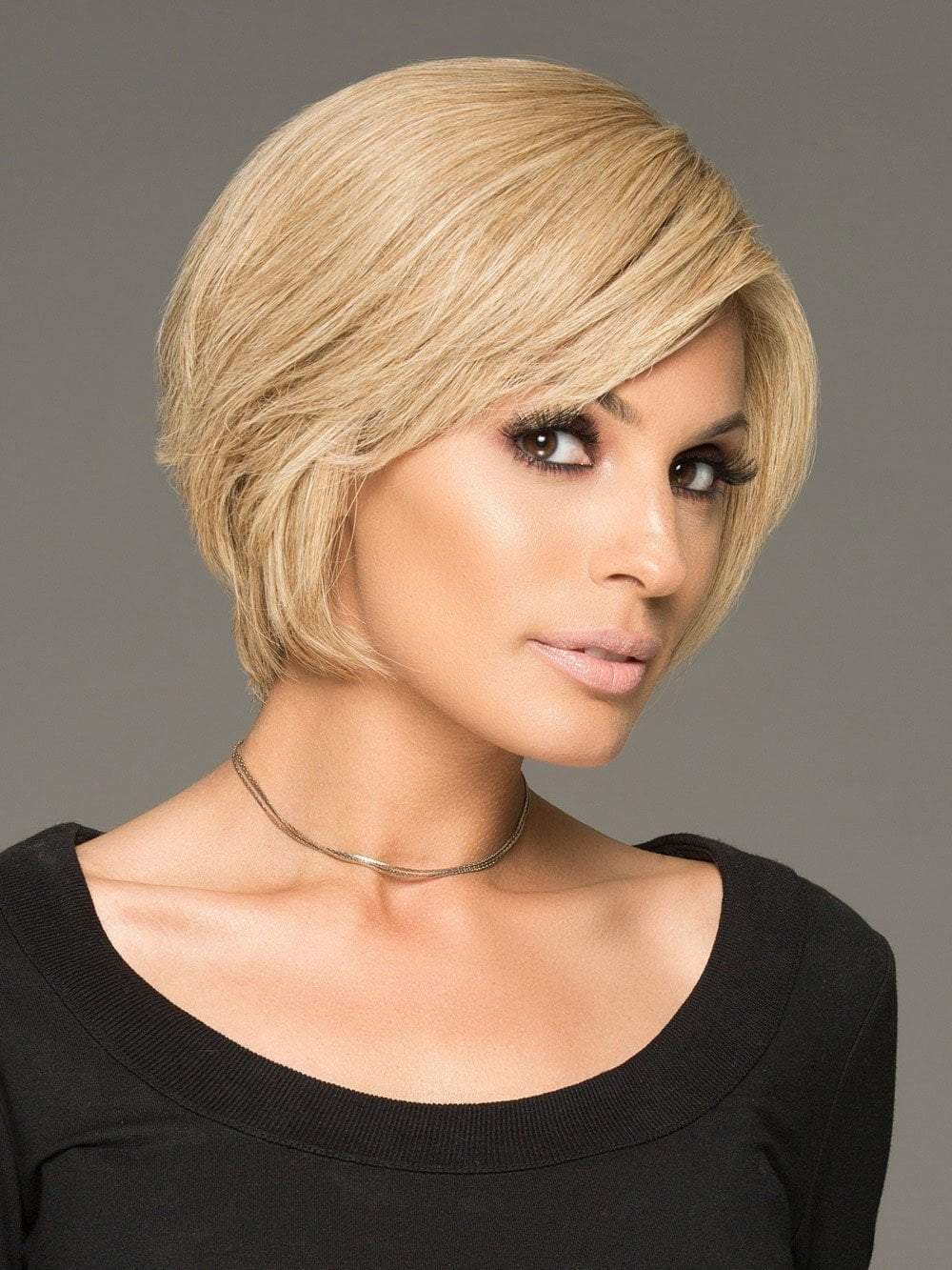 SUCCESS STORY by Raquel Welch in R1621S+ GLAZED SAND | Dark Natural Blonde with Cool Ash Blonde Highlights on Top (This piece has been styled and straightened)