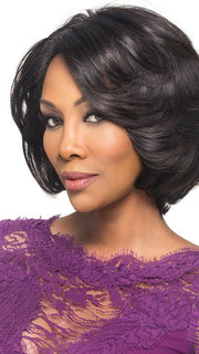 A layered, wavy style with an invisible side part