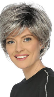 The True Wig by Estetica is a short, feathery layered cut with volume and wispy full bangs