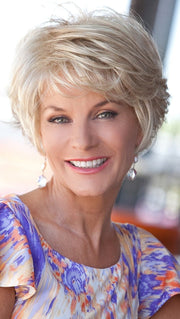 A fresh, sophisticated style with layers of softly curled hair in the front and sides, and collar-length back