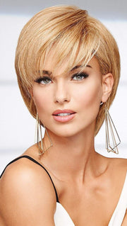The 100% human hair can be tucked behind the ears and styled like a pixie or a short bob with face-framing layers. 