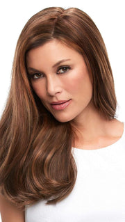 Providing the most coverage of any clip in hair topper
