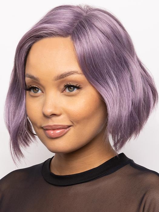 This heat-friendly synthetic style has a lace front and left lace part for styling versatility