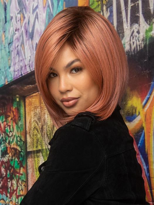 This short heat-friendly synthetic wig has a light density