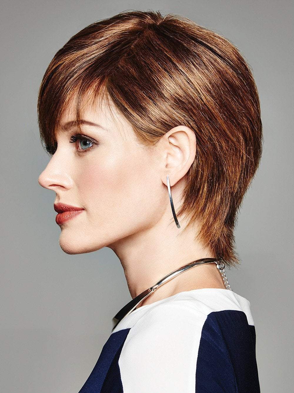 The Without Consequence Wig by Raquel Welch brings style and sophistication to an edgy haircut.
