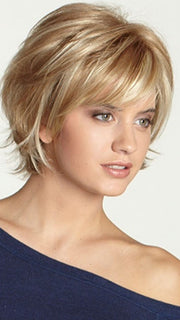Monofilament top allows this short wig to be brushed and parted several ways.
