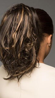 The claw clip attachment clips onto your own ponytail 