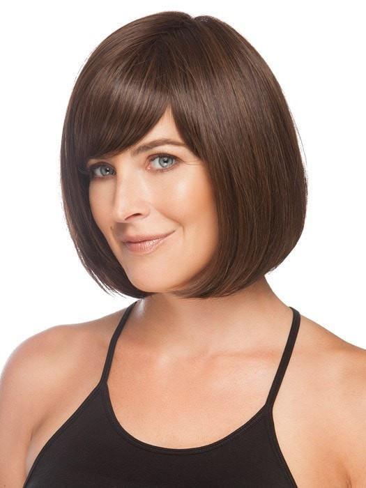 Layers wrap below the jawline giving all face shapes a flattering look | Color: Medium Brown