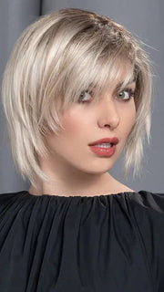 A  modern cut with an extended lace front and monofilament part